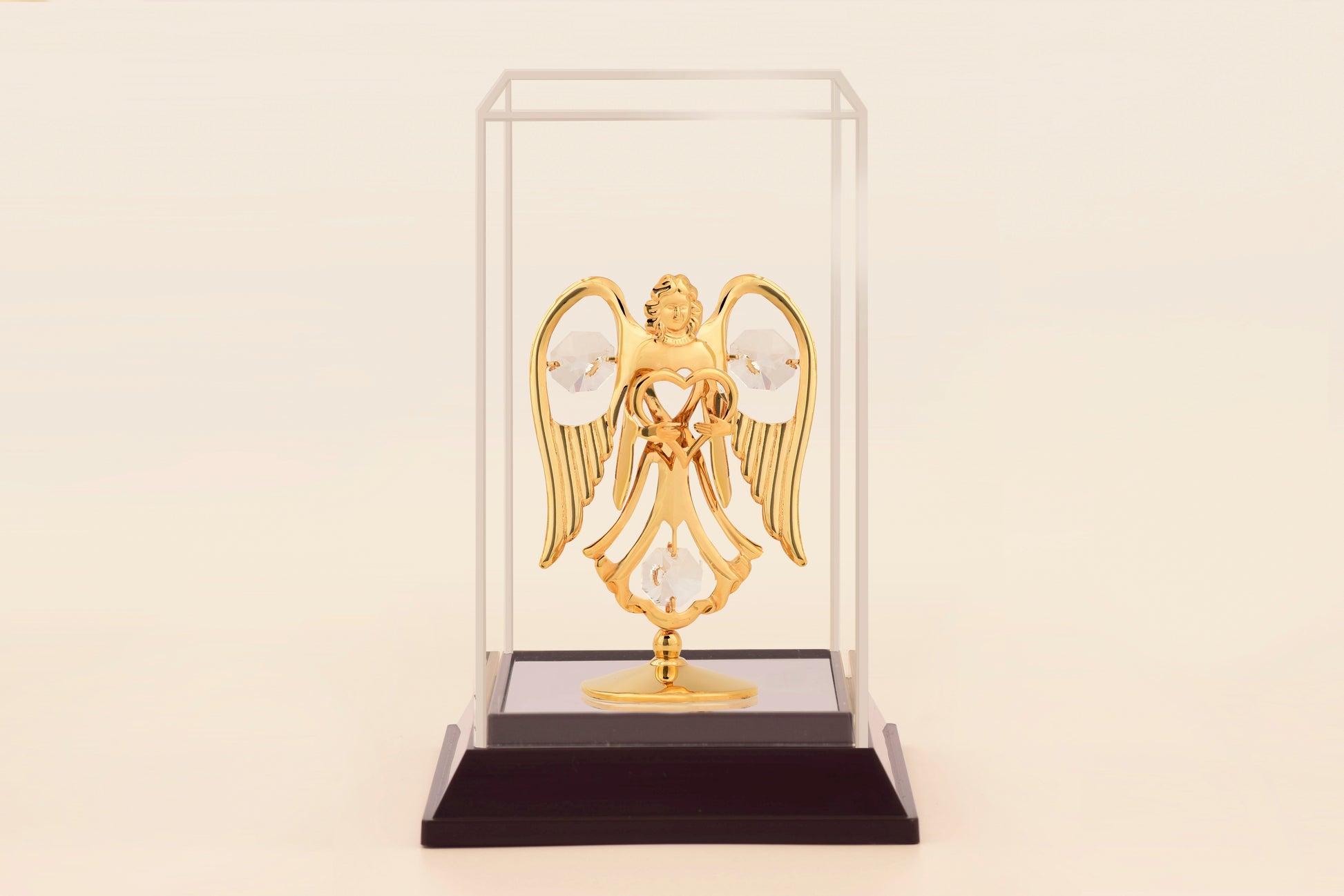 ANGEL WITH HEART IN CABINET